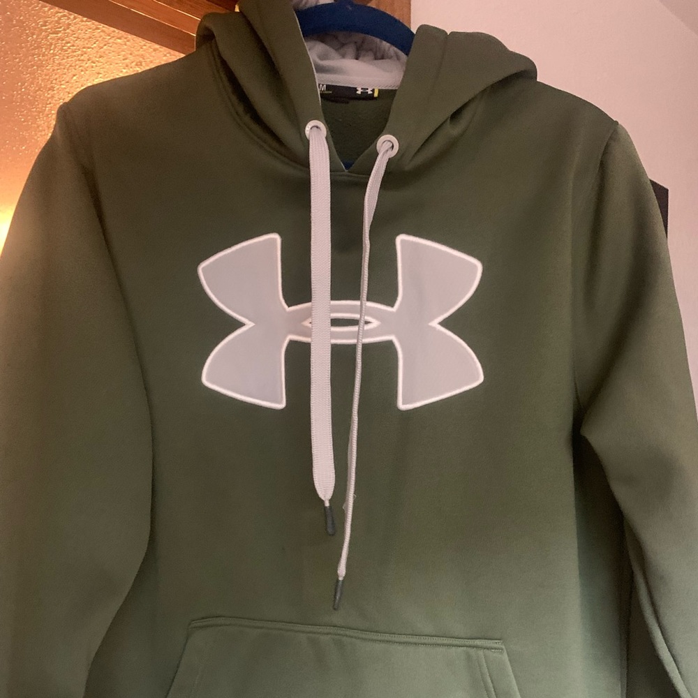 Men’s hoodie, a couple of spots on front pocket